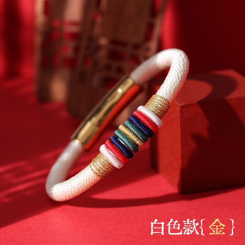 The Ninefold Kashaya Red String Bracelet