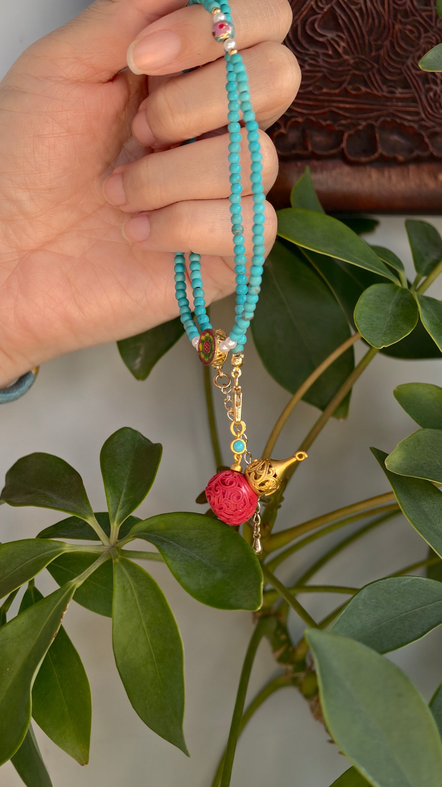 Turquoise and Cinnabar Hulu necklace