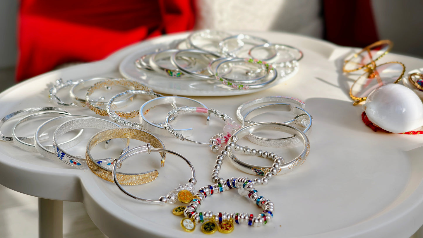 Sterling Silver Bangle: Adorable Paw Print Design