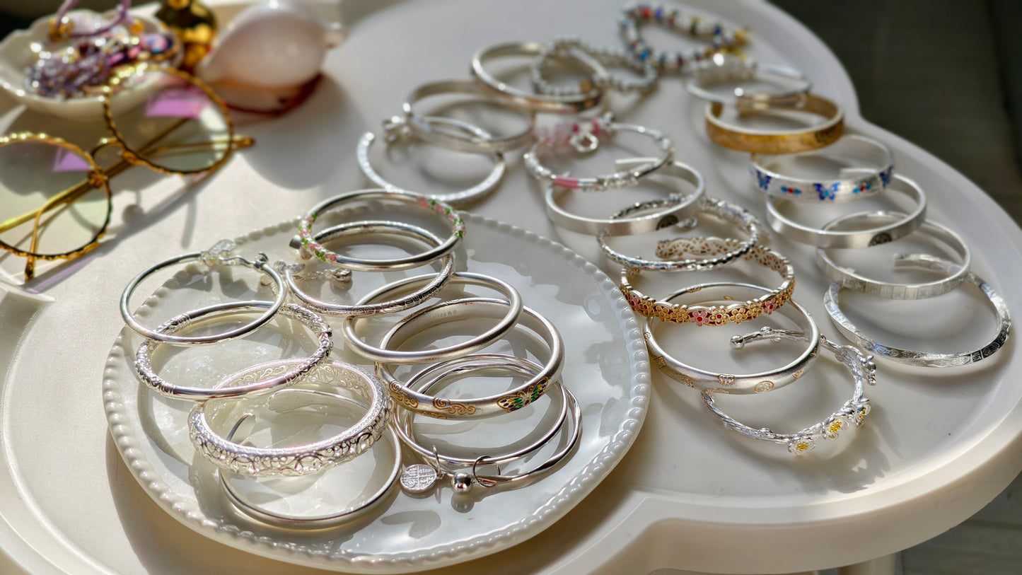 Sterling Silver Bangle: Adorable Paw Print Design