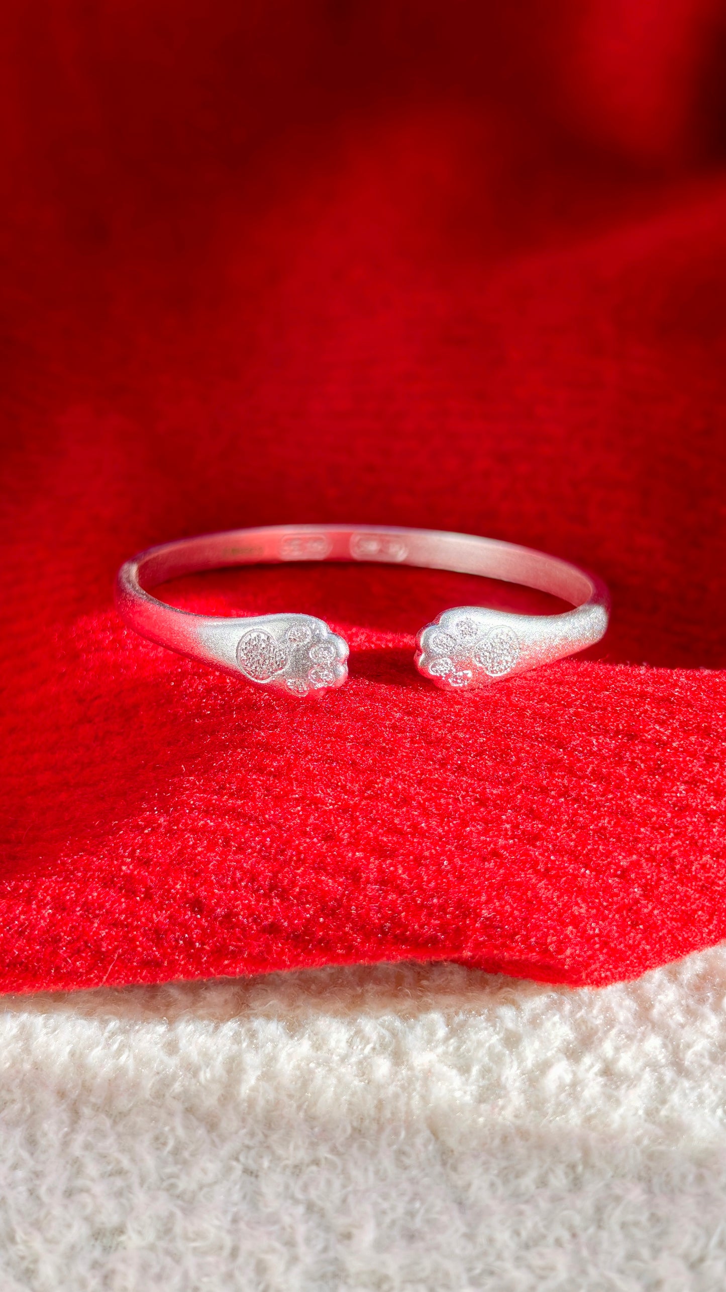 Sterling Silver Bangle: Adorable Paw Print Design