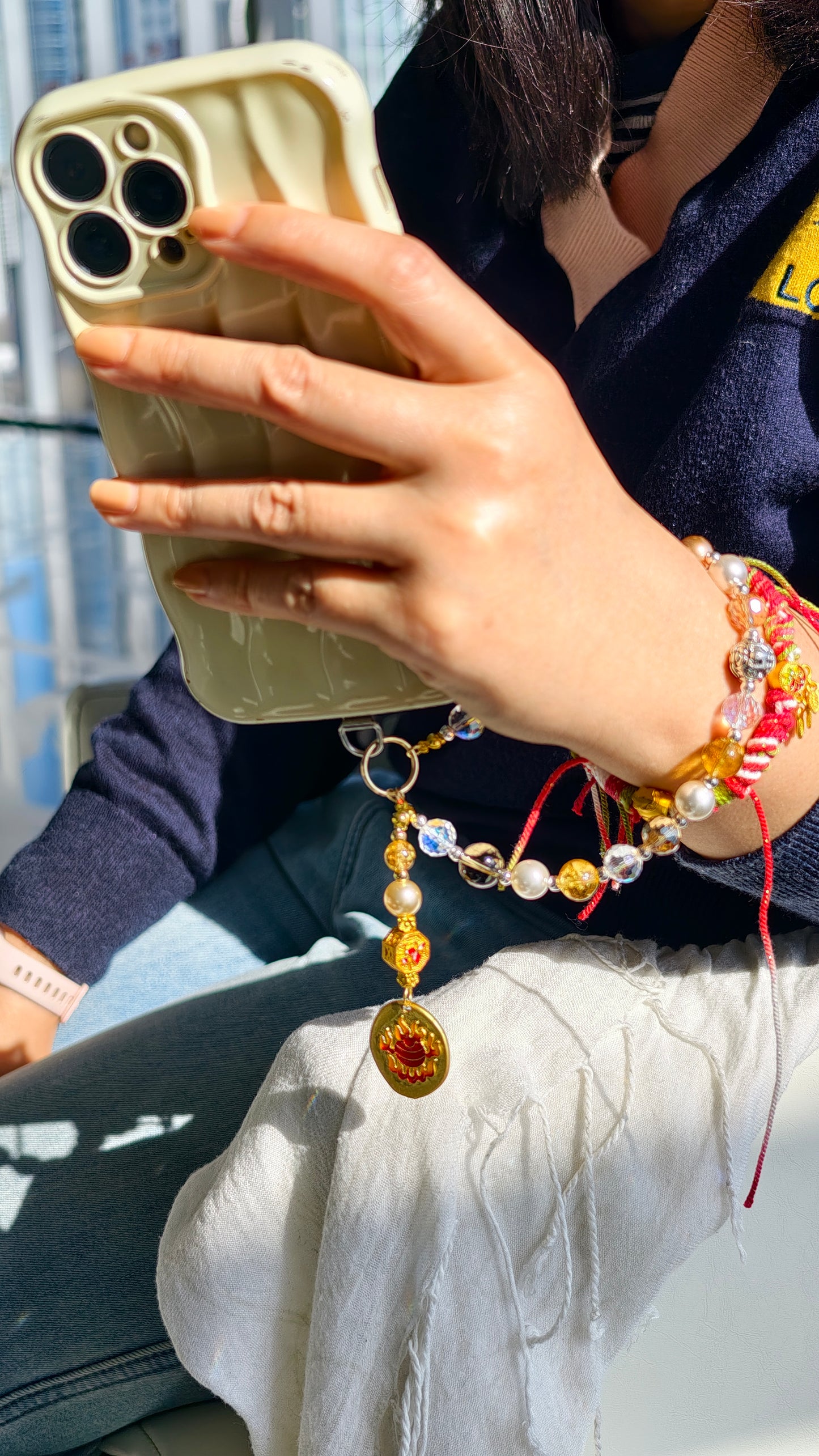 Phone charm (Champagne, paired with a Yellow Jambhala pendant)