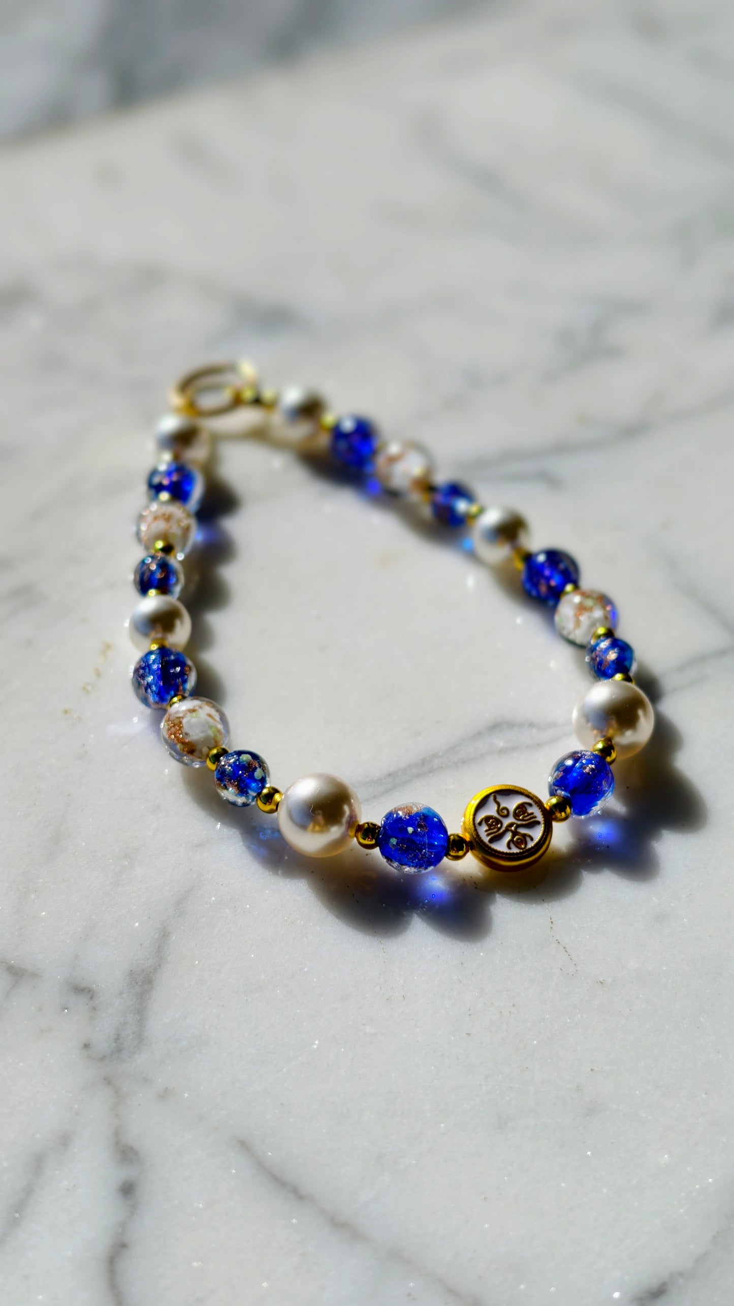 Phone Charm (blue and pearl white, paired with White Jambhala)