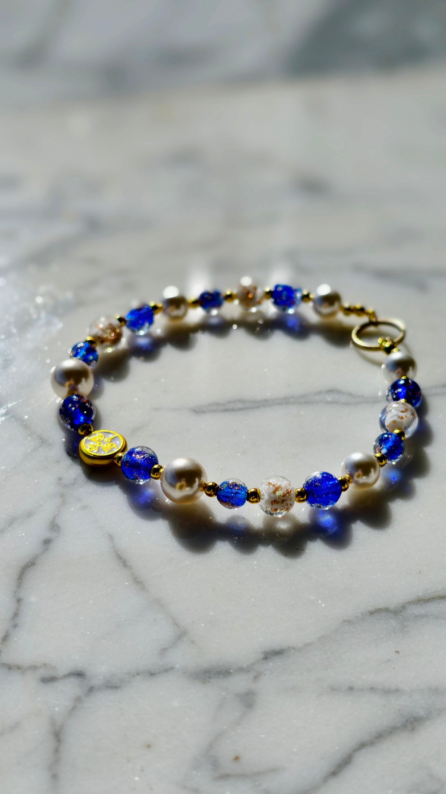 Phone Charm (blue and pearl white, paired with White Jambhala)